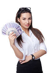 Image showing Business woman holding British pounds