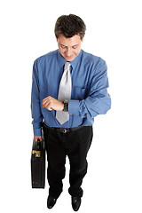 Image showing Businessman checking time