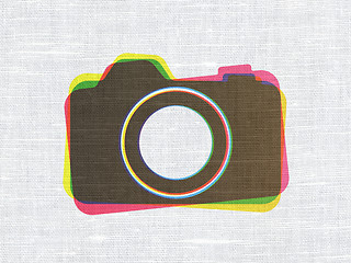 Image showing Vacation concept: Photo Camera on fabric texture background