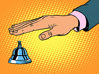 Image showing reception Desk call bell hand