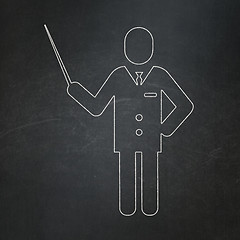 Image showing Learning concept: Teacher on chalkboard background