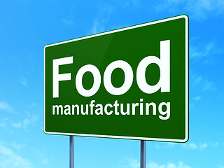 Image showing Manufacuring concept: Food Manufacturing on road sign background