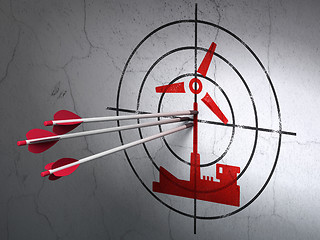 Image showing Manufacuring concept: arrows in Windmill target on wall background