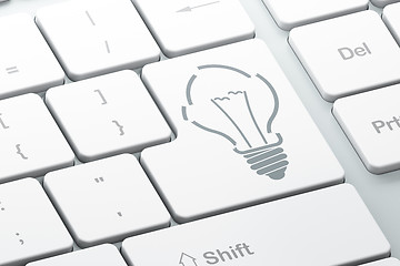 Image showing Finance concept: Light Bulb on computer keyboard background