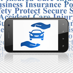 Image showing Insurance concept: Smartphone with Car And Palm on display