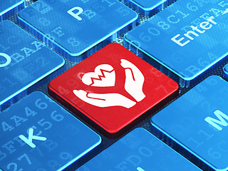 Image showing Insurance concept: Heart And Palm on computer keyboard background