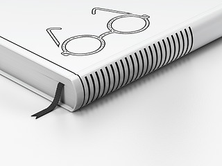 Image showing Education concept: closed book, Glasses on white background