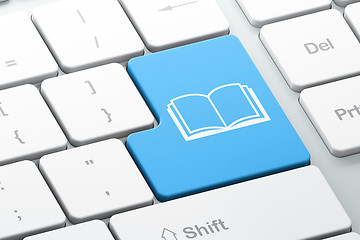 Image showing Learning concept: Book on computer keyboard background