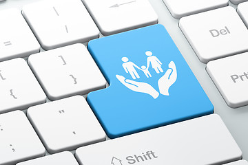Image showing Insurance concept: Family And Palm on computer keyboard background
