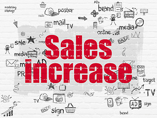 Image showing Advertising concept: Sales Increase on wall background