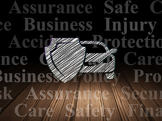 Image showing Insurance concept: Car And Shield in grunge dark room