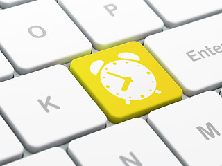 Image showing Time concept: Alarm Clock on computer keyboard background