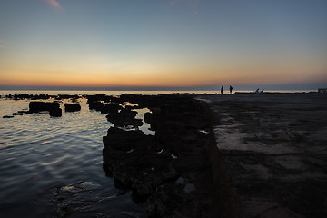 Image showing gorgeous sunset on the rocky coast of Adriatic