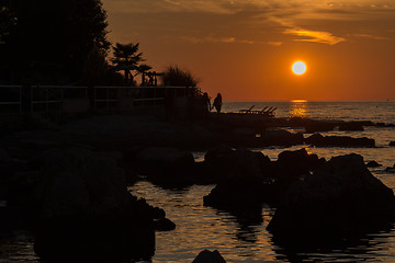 Image showing gorgeous sunset on the rocky coast of Adriatic