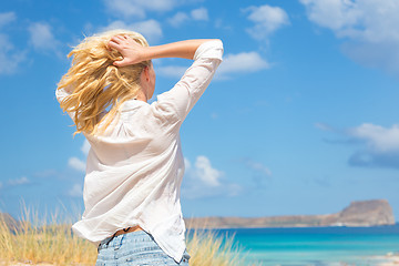 Image showing Free Happy Woman Enjoying Sun on Vacations.