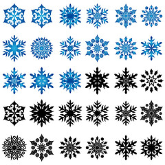 Image showing Set of thirty blue and black snowflakes