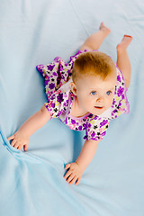 Image showing baby girl in a dress. Studio