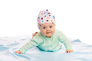 Image showing baby girl in a hat. Studio