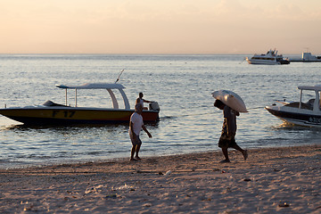 Image showing Men transports cargo from ship