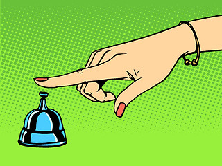 Image showing Call the Concierge woman hand bell