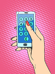 Image showing Smartphone woman dials the phone number