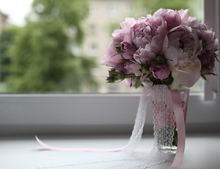 Image showing bridal bouquet on the window