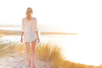 Image showing Free Happy Woman Enjoying Sun on Vacations.