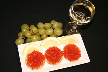 Image showing Russian caviar and a glass of white wine