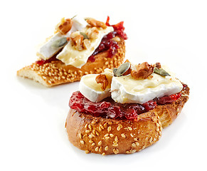 Image showing toasted bread with jam and brie