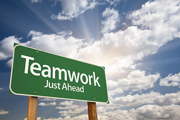 Image showing Teamwork Green Road Sign Over Clouds