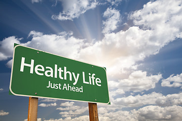 Image showing Healthy Life Green Road Sign Over Clouds