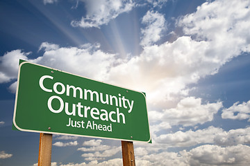 Image showing Community Outreach Green Road Sign Over Clouds