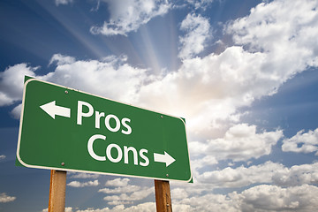 Image showing Pros and Cons Green Road Sign Over Clouds