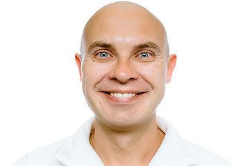 Image showing Bald smiling man. Isolated. Studio