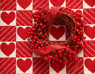 Image showing wreath with red berries and hearts