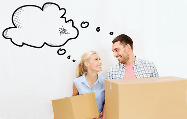 Image showing couple with delivery boxes moving to new home
