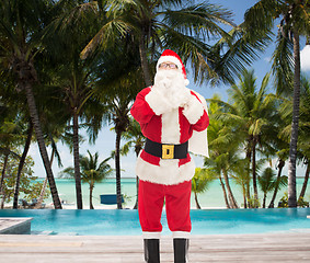 Image showing man in costume of santa claus with bag