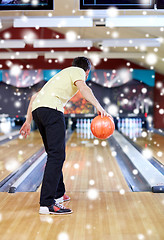 Image showing young man throwing ball in bowling club