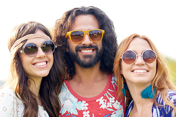 Image showing smiling young hippie friends outdoors