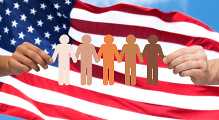 Image showing hands with people pictogram over american flag