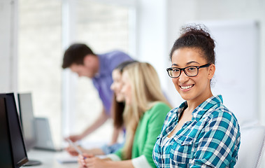 Image showing happy high school students in computer class