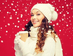 Image showing woman in hat with takeaway tea or coffee cup