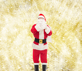 Image showing man in costume of santa claus with bag