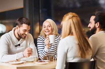 Image showing happy couple meeting and drinking tea or coffee