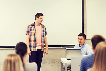 Image showing group of students and teacher in classroom