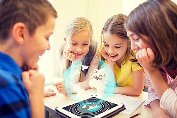 Image showing group of school kids with tablet pc in classroom