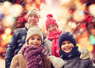 Image showing happy family in winter clothes outdoors