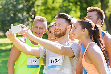 Image showing teenage sportsmen taking selfie with smartphone