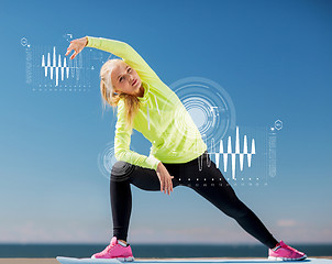 Image showing woman doing sports outdoors