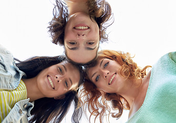 Image showing happy young women or teenage girls in circle